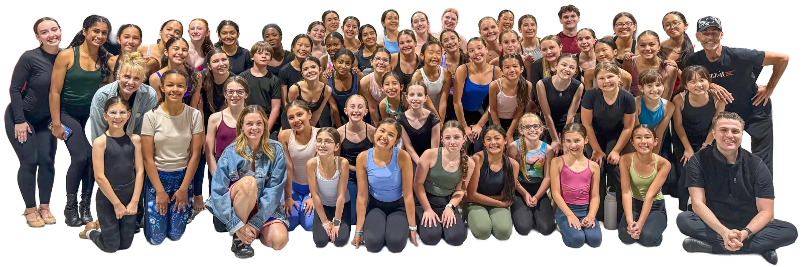 The Encore Performers family — dozens of dancers and teachers gathered together, smiling after class