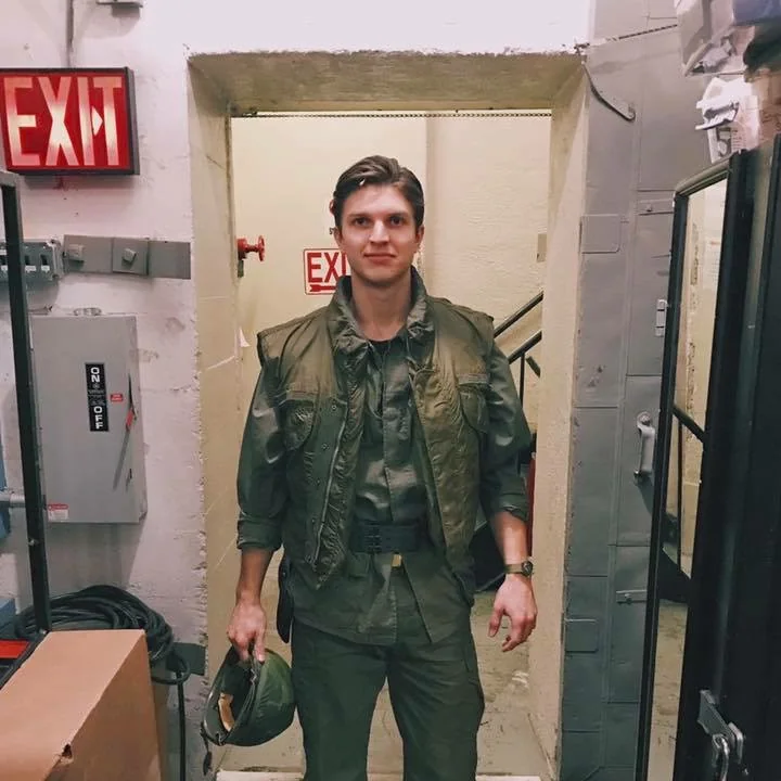 Colby Dezelick backstage in military costume for Miss Saigon