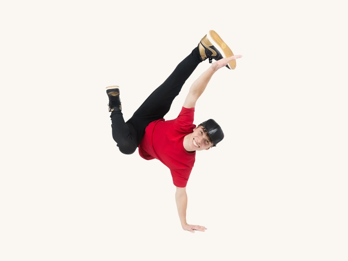 Encore dancer in streetwear posing in a hip hop stance