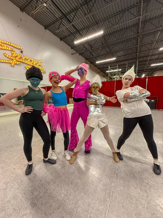 Dancers running choreography in the studio rehearsal space